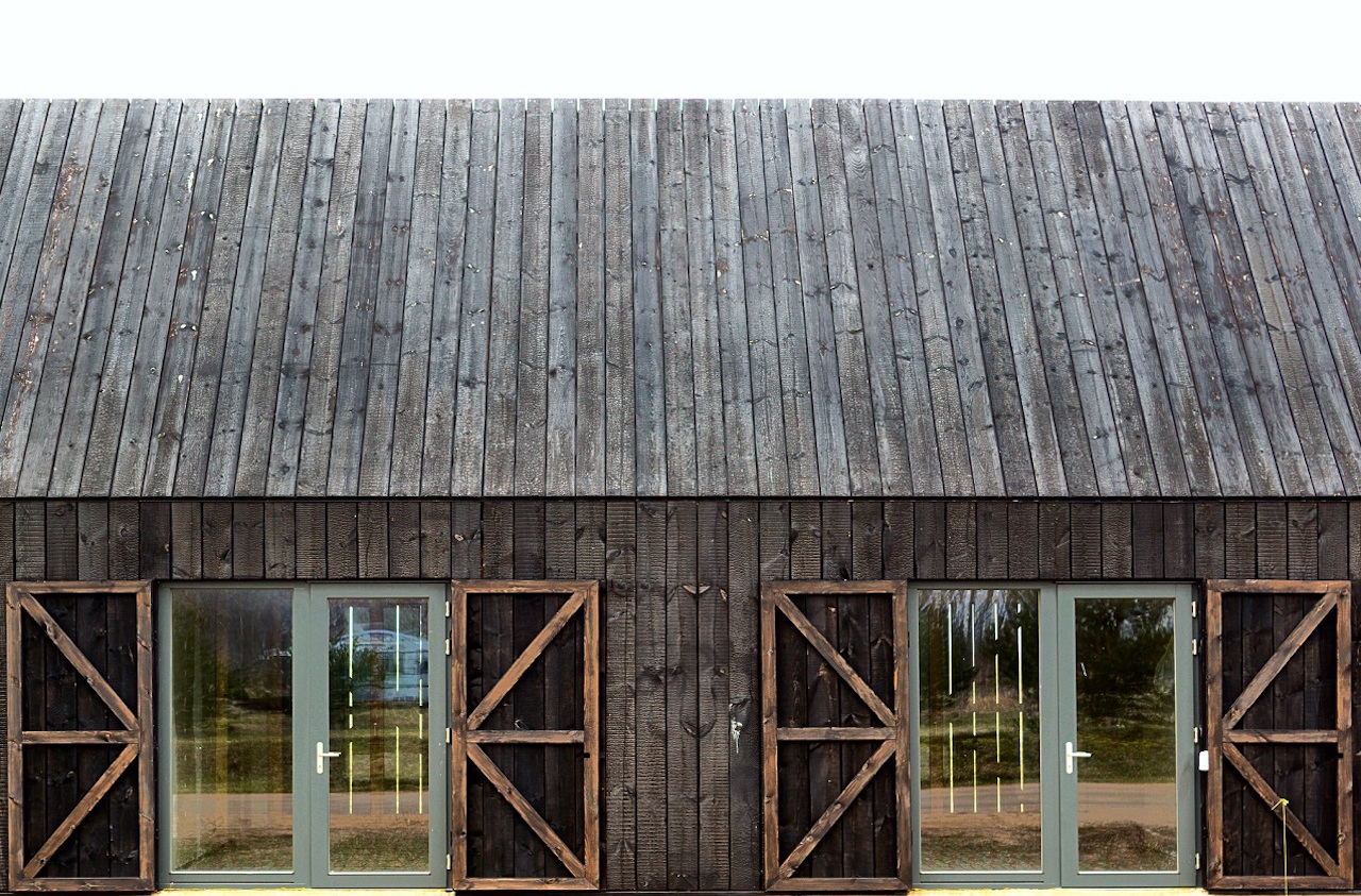 The facade of a house made with shou sugi ban wood siding