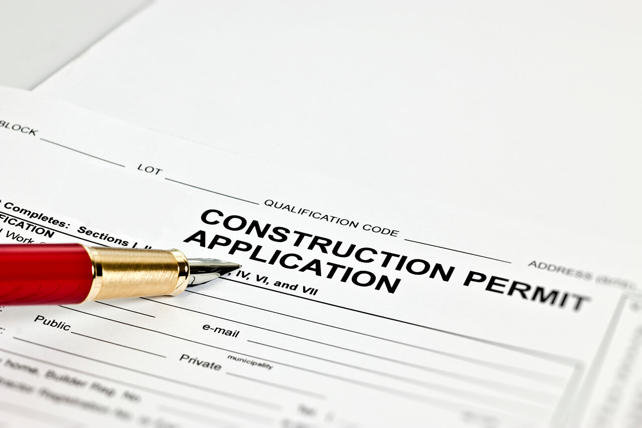 construction permit application being filled out