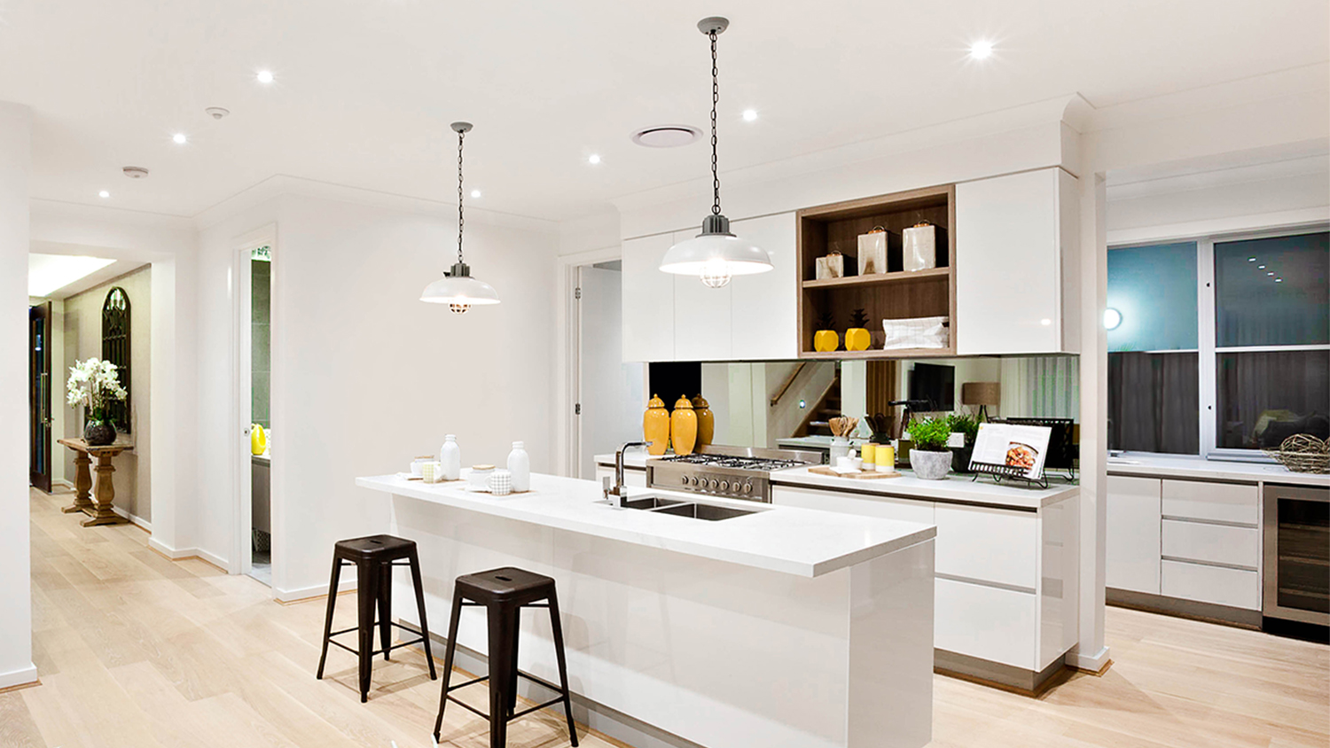 modern kitchen with light vinyl floors throughout home