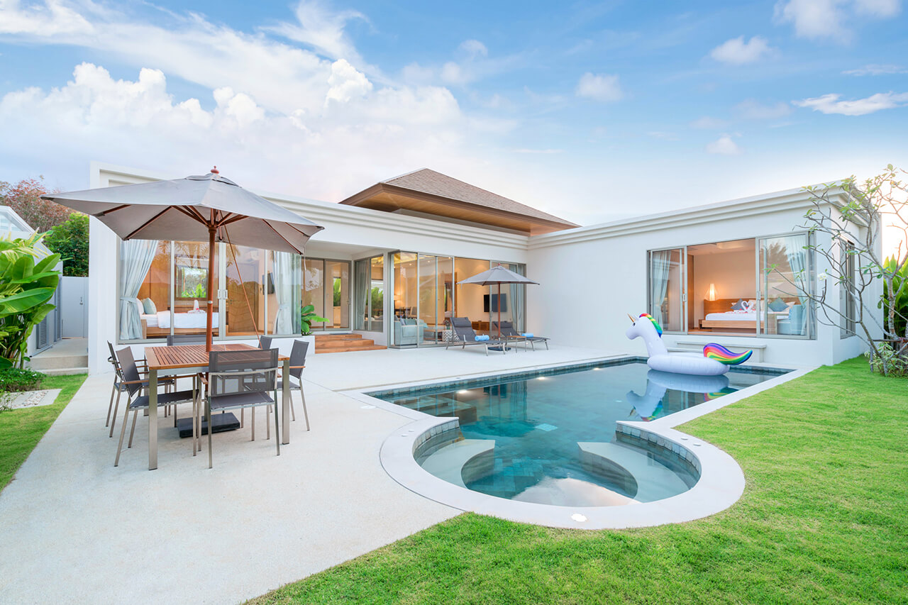new saltwater swimming pool in backyard of modern house